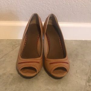 Tan and red wedge heels
